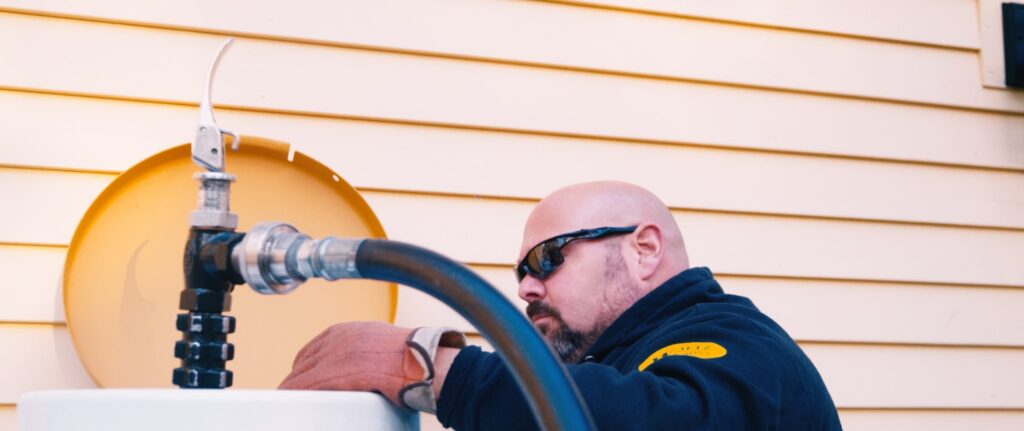 waltz propane technician checking a tank